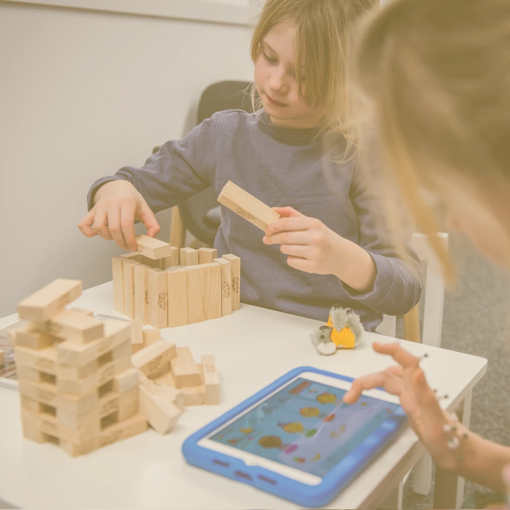 A child interacting with a digital tablet.